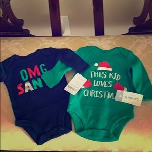 Newborn onesies.  Long sleeved.  Christmas time.